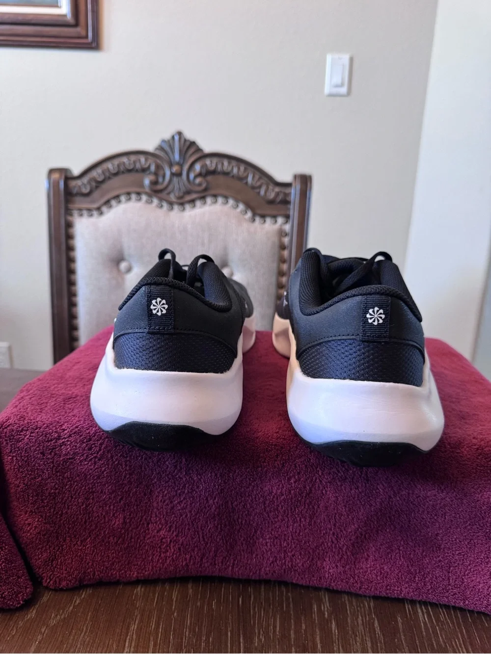11 Men’s Nike Black Running Sneakers with White Swoosh